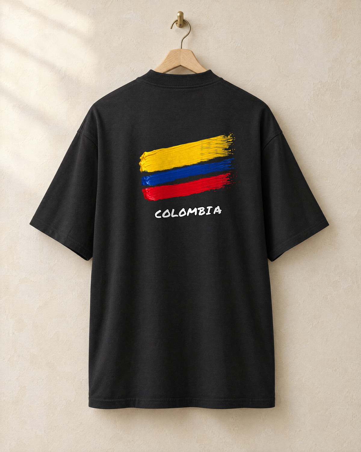 Bandera tee in black, back, on a hanger