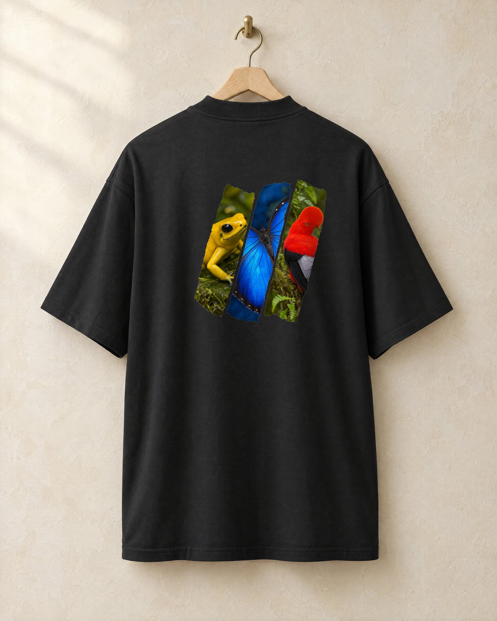 Diagonal tee in black, back, on a hanger