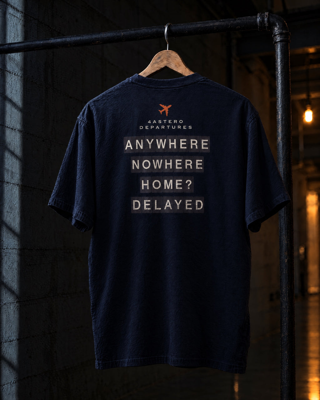 Departures back print on a navy 4ASTERO heavyweight tee, on a hanger