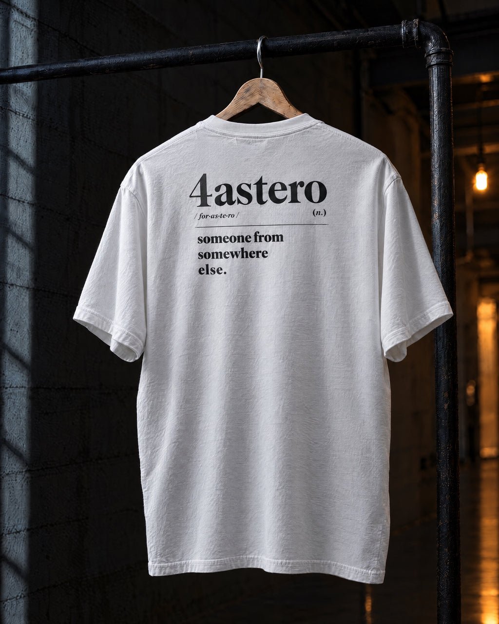 Dictionary back print on a white 4ASTERO heavyweight tee, on a hanger