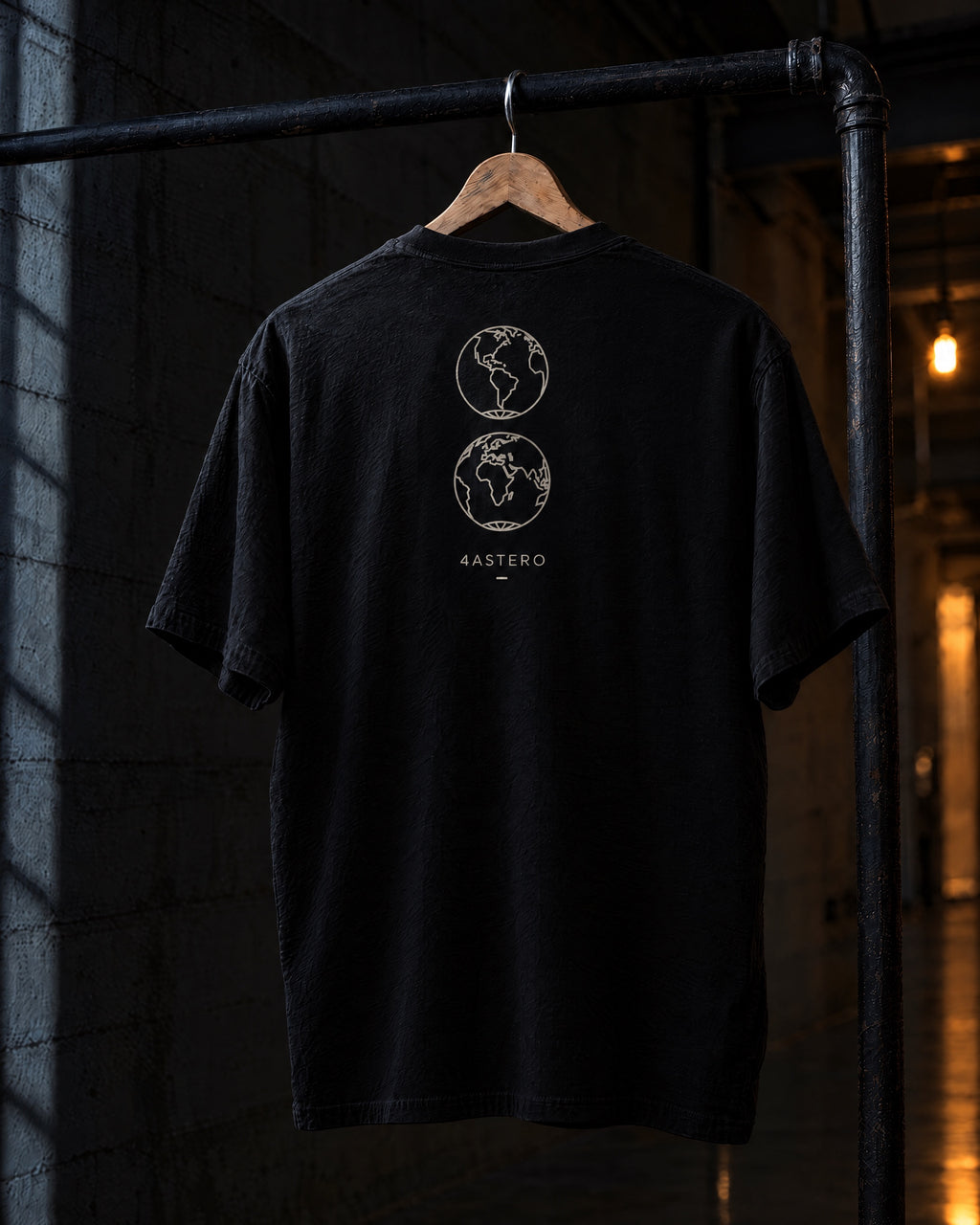 Borderless back print on a black 4ASTERO heavyweight tee, on a hanger