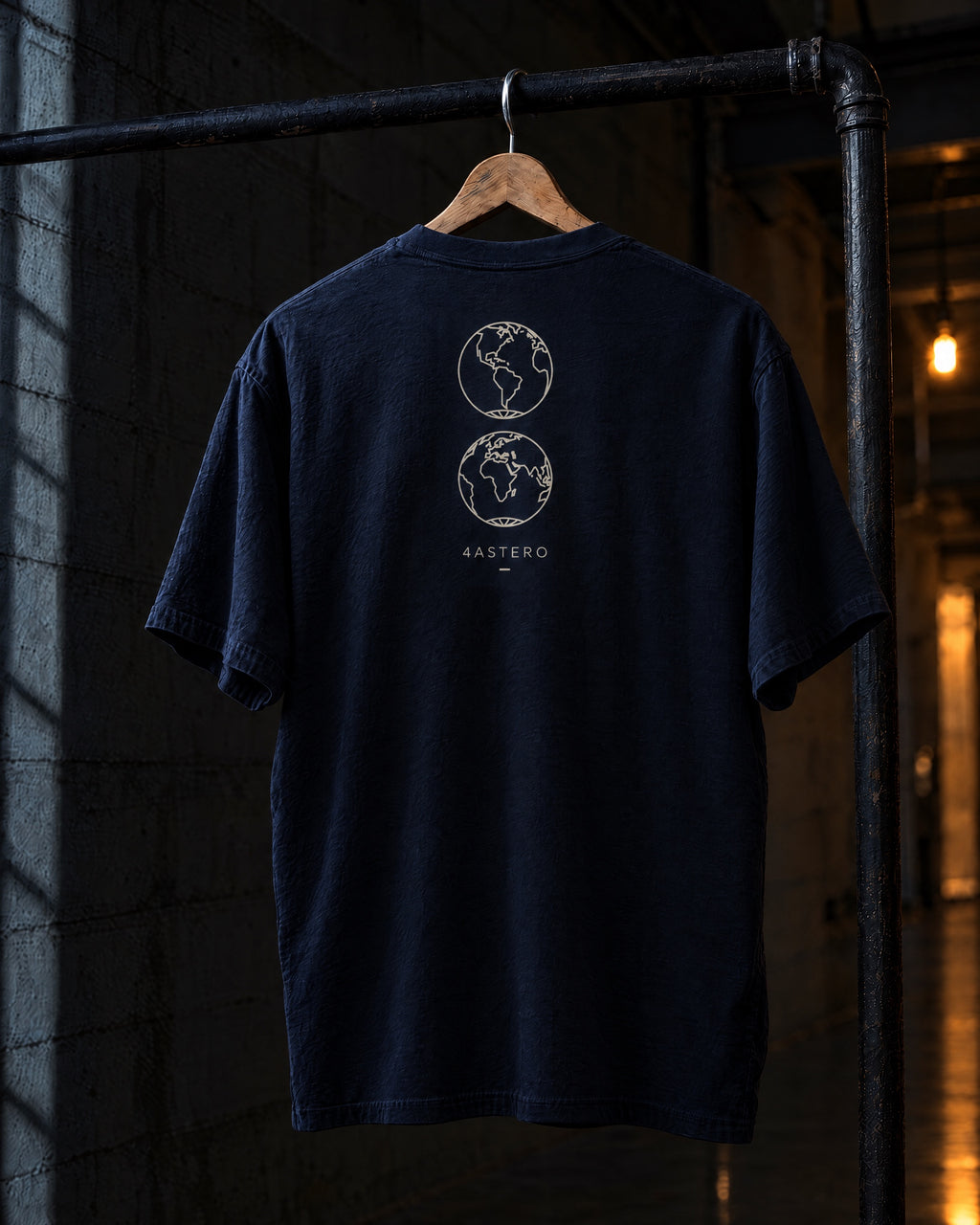 Borderless back print on a navy 4ASTERO heavyweight tee, on a hanger