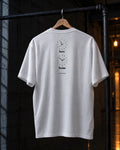 Here / Home back print on a white 4ASTERO heavyweight tee, on a hanger