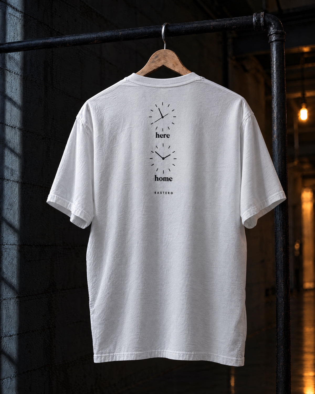 Here / Home back print on a white 4ASTERO heavyweight tee, on a hanger