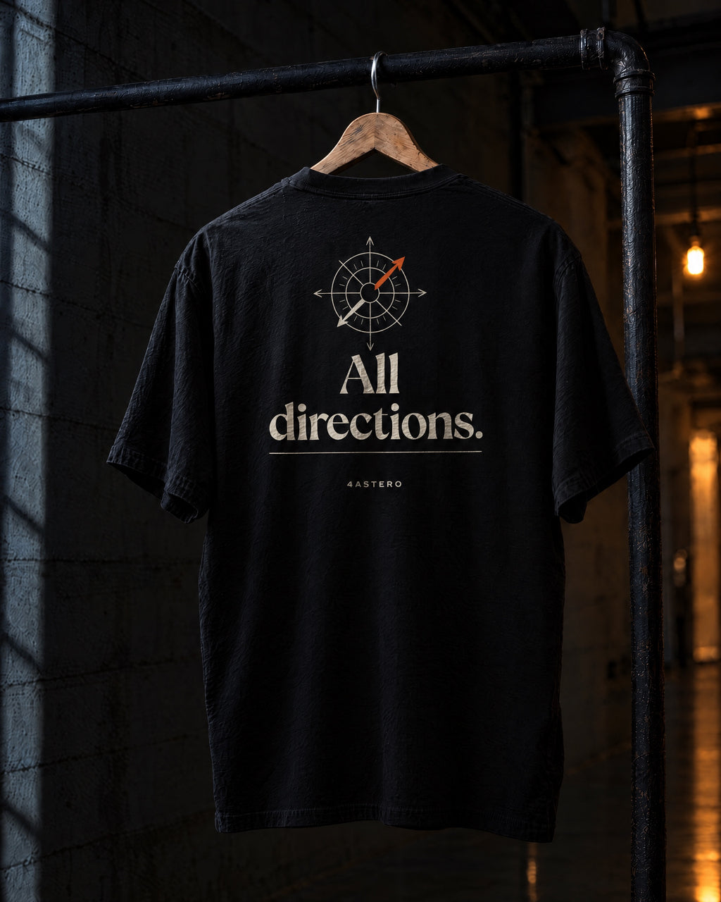All Directions back print on a black 4ASTERO heavyweight tee, on a hanger