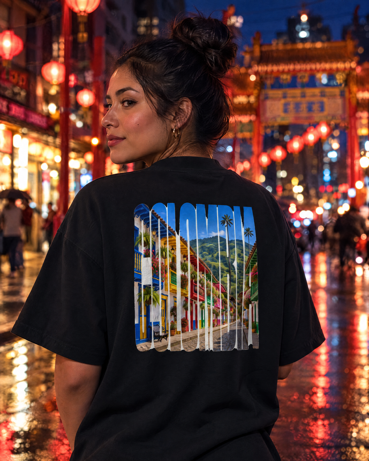 Woman in a black Salento tee on a Chinatown street in Vancouver at night