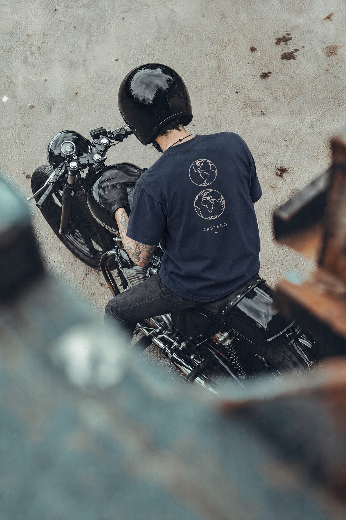 Rider on a motorcycle wearing the navy Borderless tee